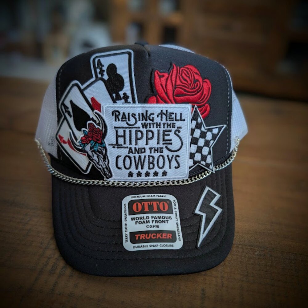 Trucker hat with iron on patches and embellishments